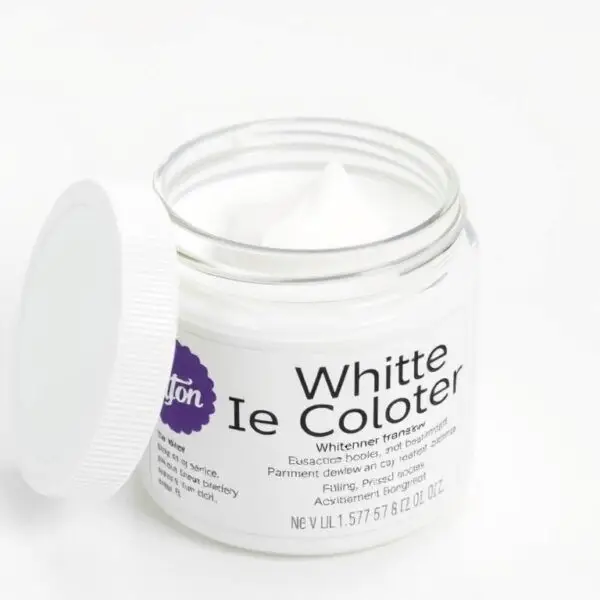 Opakowanie wybielacza Wilton z widoczną etykietą i konsystencją produktu